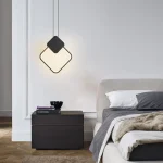 Lampe de chevet suspendue LED nordique au‑dessus d’une table de nuit dans une chambre modern